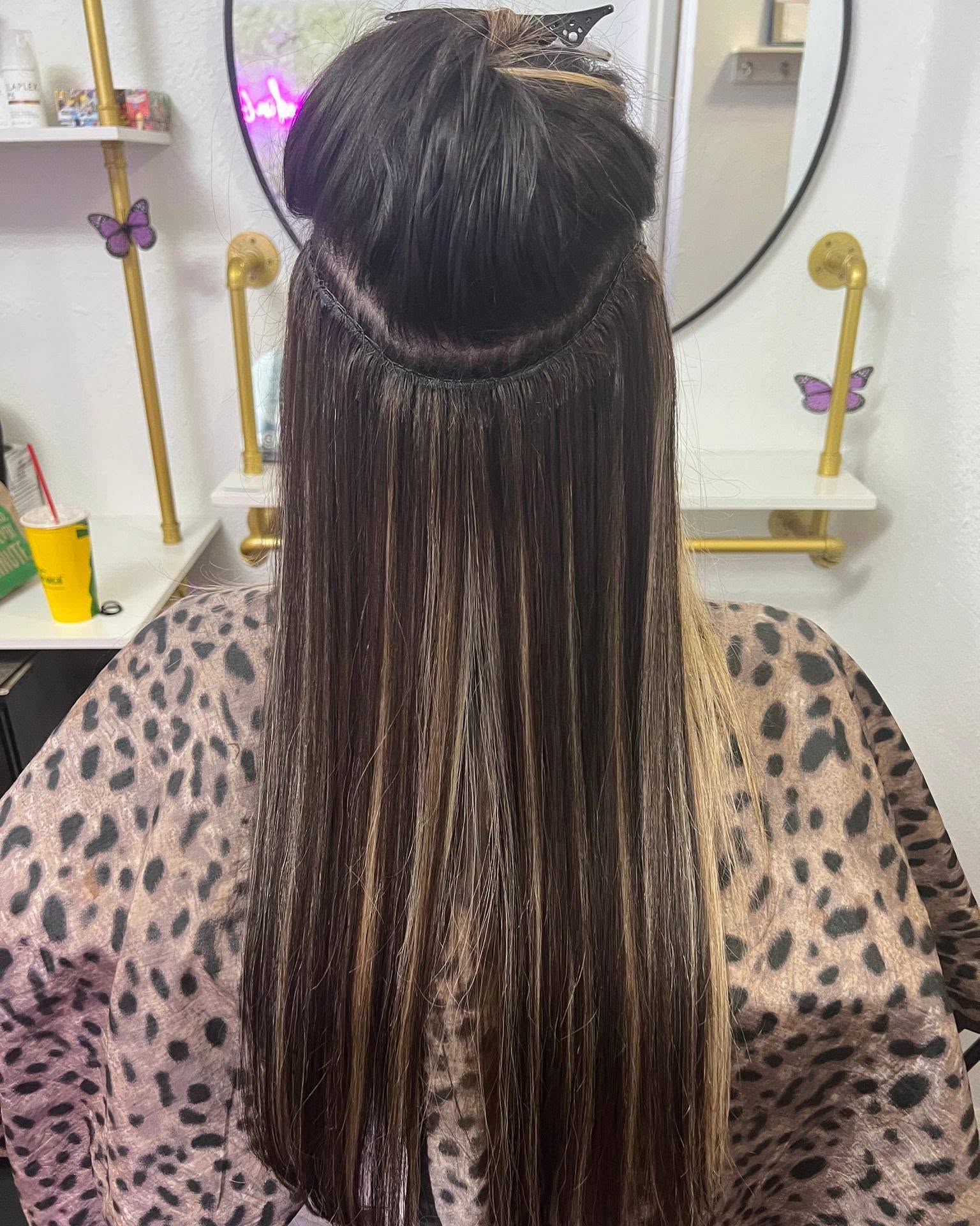 Client transformation featuring custom-blended hair extensions